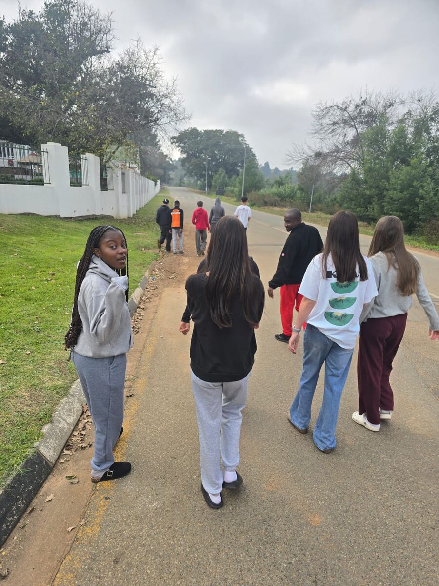 Learners walking together outside